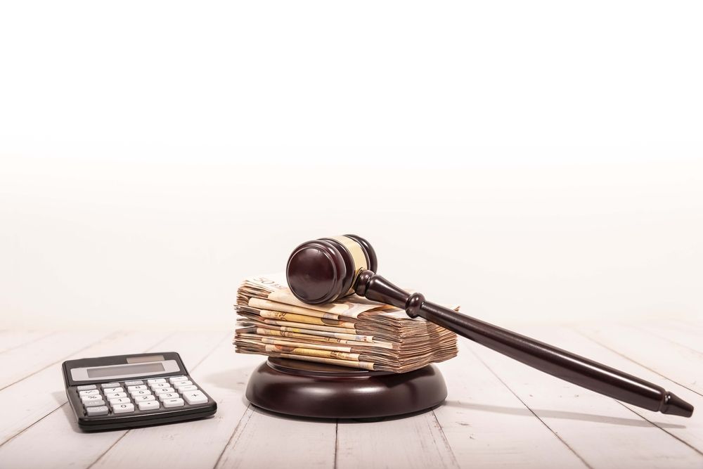 Compensation,And,Judge's,Gavel.,Award,Of,Moral,Financial,Compensation,For